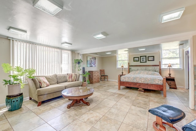 2506 Birkenhead Dr, Charleston, SC 29414 - bedroom with a skylight, baseboards, and light tile patterned flooring