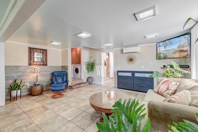 2506 Birkenhead Dr, Charleston, SC 29414 - living room featuring a wall mounted air conditioner, washer and dryer, and light tile patterned flooring