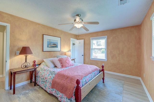 2506 Birkenhead Dr, Charleston, SC 29414 - bedroom with wood finished floors, visible vents, a ceiling fan, and baseboards