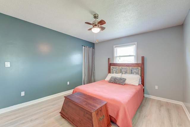 2506 Birkenhead Dr, Charleston, SC 29414 - bedroom featuring light wood-type flooring, a ceiling fan, baseboards, and a textured ceiling