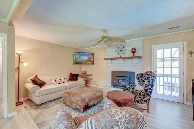 2506 Birkenhead Dr, Charleston, SC 29414 - living room featuring visible vents, wood finished floors, a textured ceiling, and crown molding
