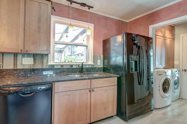 2506 Birkenhead Dr, Charleston, SC 29414 - kitchen featuring washing machine and clothes dryer, a sink, dark stone countertops, backsplash, and black appliances