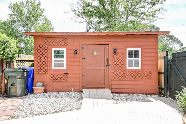 2506 Birkenhead Dr, Charleston, SC 29414 - view of outbuilding featuring a gate, an outdoor structure, and fence