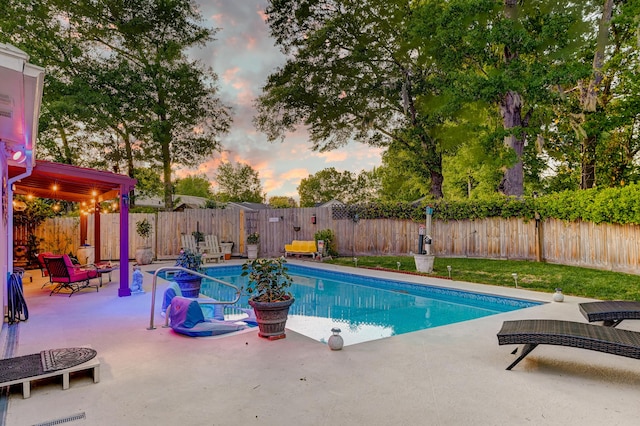 2506 Birkenhead Dr, Charleston, SC 29414 - pool at dusk featuring a fenced in pool, a fenced backyard, and a patio