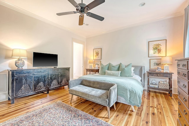 312 Hobcaw Dr, Mount Pleasant, SC 29464 - bedroom with ornamental molding, wood finished floors, and a ceiling fan