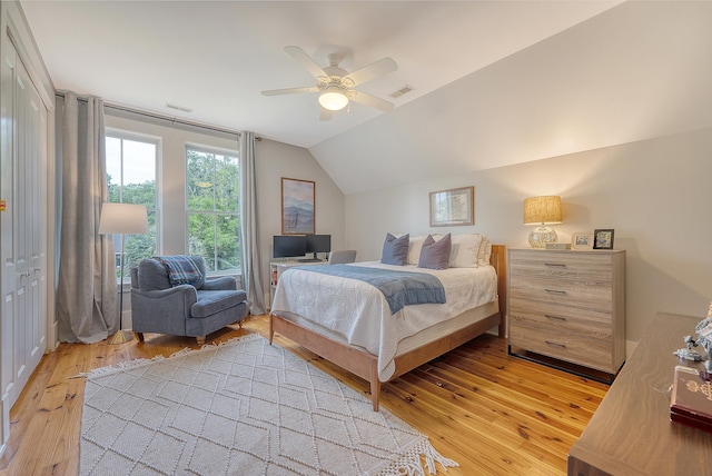 312 Hobcaw Dr, Mount Pleasant, SC 29464 - bedroom featuring light wood finished floors, vaulted ceiling, and a ceiling fan