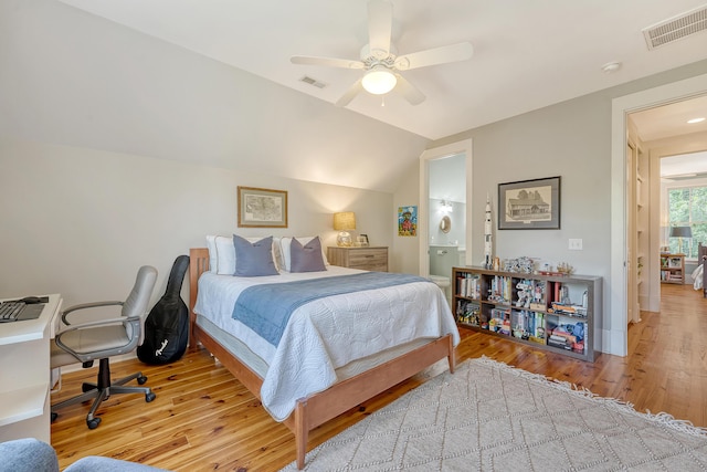 312 Hobcaw Dr, Mount Pleasant, SC 29464 - bedroom with wood finished floors, ceiling fan, connected bathroom, vaulted ceiling, and baseboards