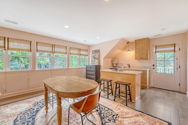 312 Hobcaw Dr, Mount Pleasant, SC 29464 - dining area with light wood finished floors, recessed lighting, and baseboards