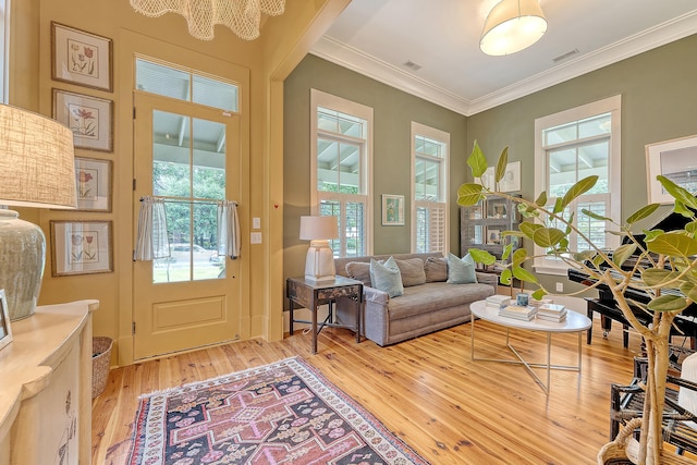 312 Hobcaw Dr, Mount Pleasant, SC 29464 - living room with light wood-style flooring and ornamental molding