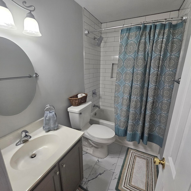 full bathroom with shower / bath combo, vanity, and toilet