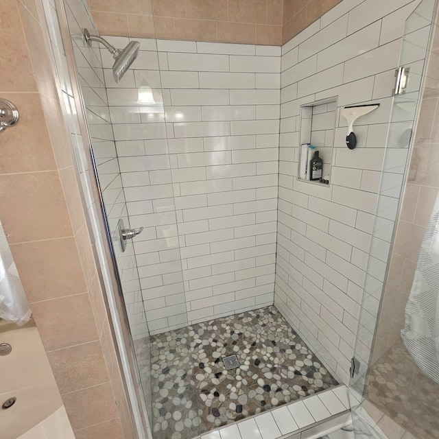 bathroom with an enclosed shower