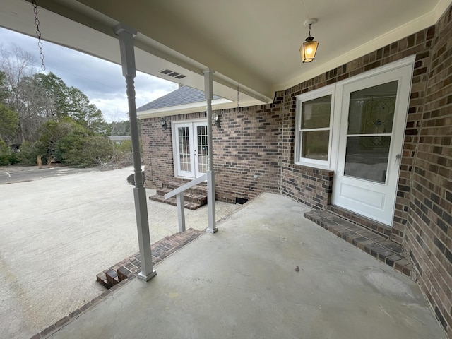 view of patio / terrace featuring french doors