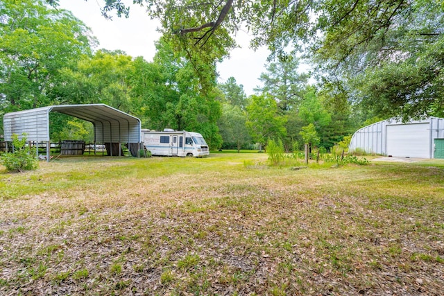 view of yard with a carport