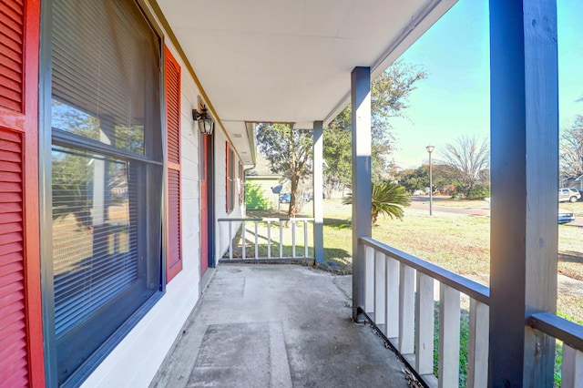 balcony featuring a porch