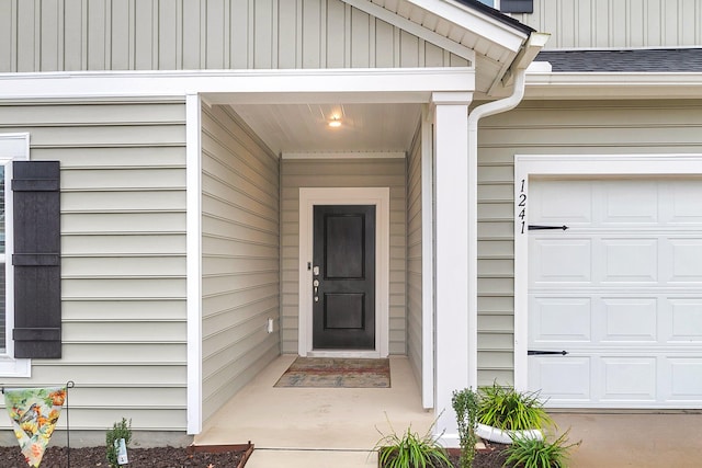 property entrance featuring a garage