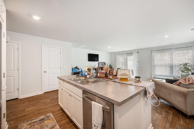 kitchen with open floor plan, dishwasher, a sink, dark wood-type flooring, and white cabinetry