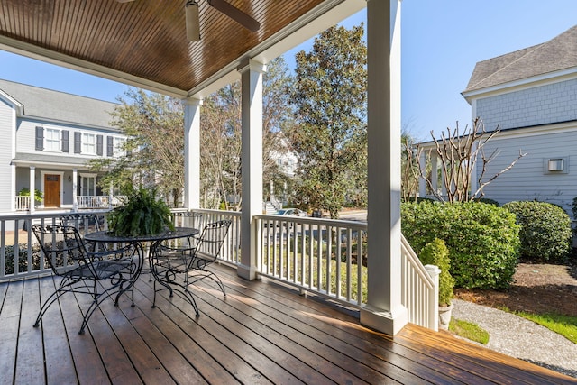 wooden deck with ceiling fan