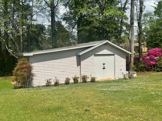 1153 Cherokee Dr, Manning, SC 29102 - view of outbuilding featuring view of wooded area
