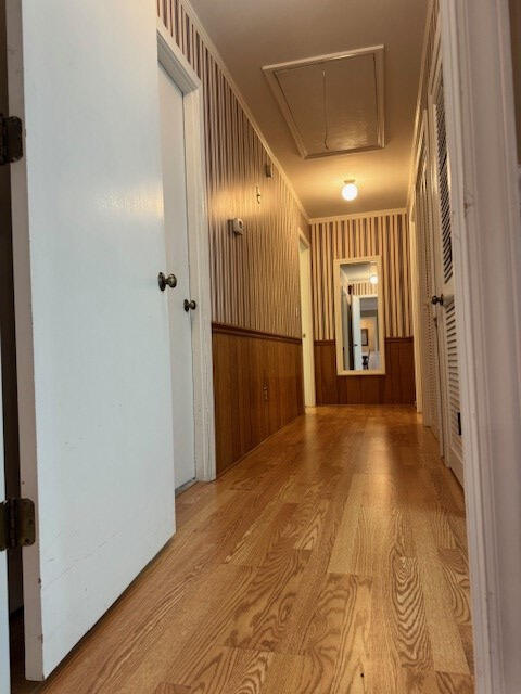 1153 Cherokee Dr, Manning, SC 29102 - hall featuring attic access and wood finished floors