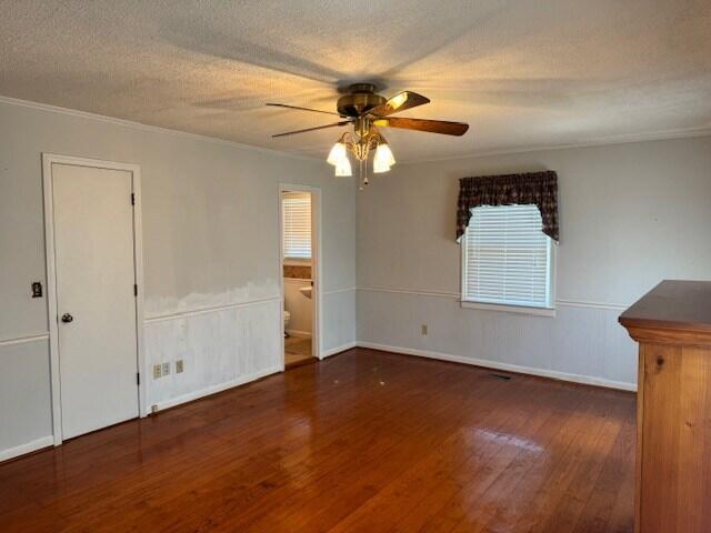 1153 Cherokee Dr, Manning, SC 29102 - unfurnished room featuring wood finished floors, ceiling fan, crown molding, and baseboards