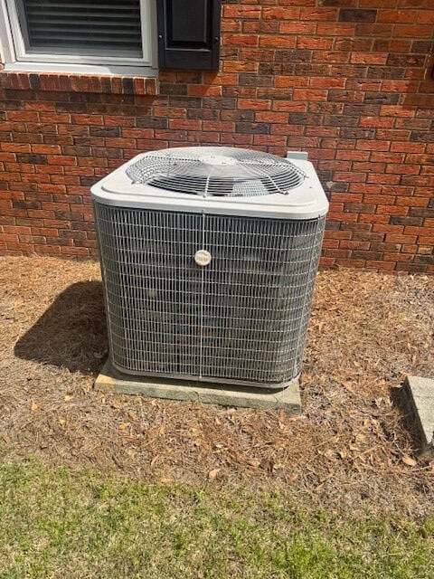 1153 Cherokee Dr, Manning, SC 29102 - exterior view of central AC and brick siding