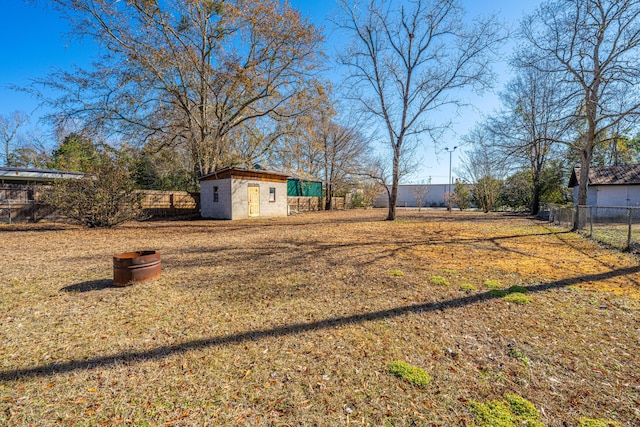 view of yard with a storage shed