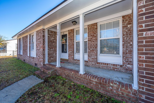 doorway to property with covered porch