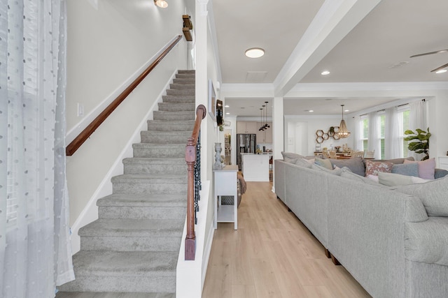 1576 Nautical Chart Dr, Charleston, SC 29414 - stairway featuring crown molding, wood finished floors, and recessed lighting