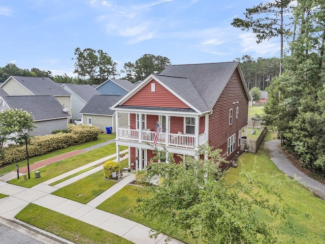 1576 Nautical Chart Dr, Charleston, SC 29414 - view of front of property featuring covered porch, roof with shingles, a front yard, and a balcony
