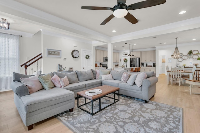 1576 Nautical Chart Dr, Charleston, SC 29414 - living area with a chandelier, light wood finished floors, ceiling fan, ornamental molding, and recessed lighting