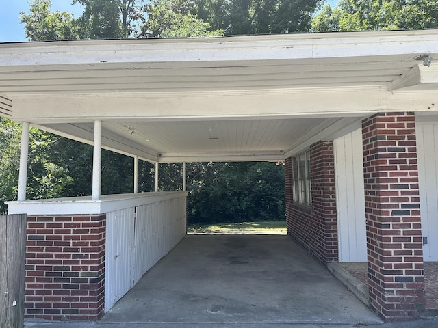 view of vehicle parking featuring an attached carport