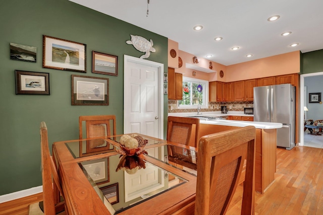 dining room featuring light wood-type flooring