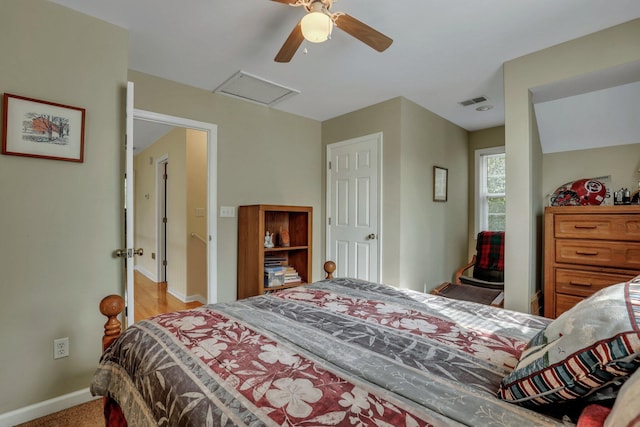 bedroom featuring ceiling fan and light colored carpet