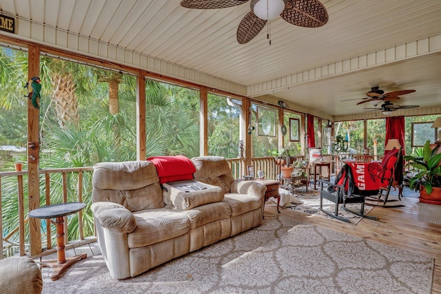 sunroom / solarium with ceiling fan and a healthy amount of sunlight