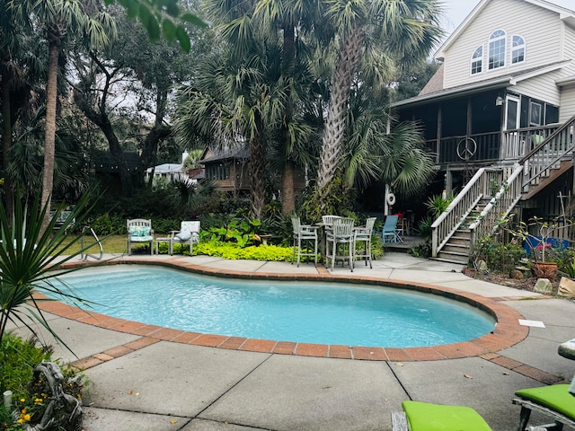 view of pool featuring a patio