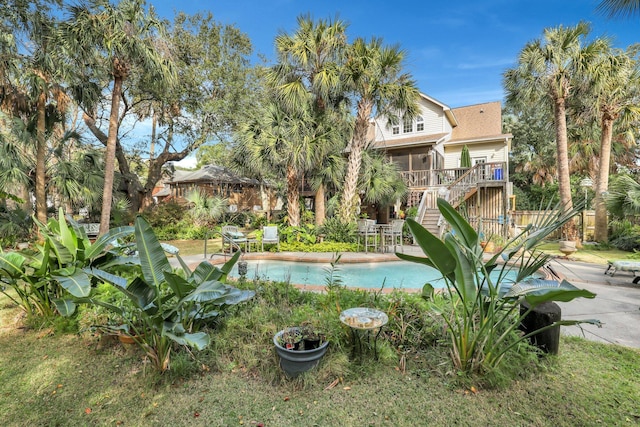 view of pool featuring a patio area and a deck