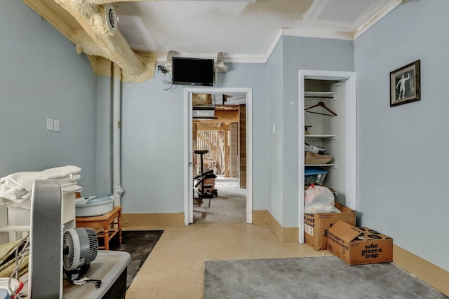 interior space with crown molding