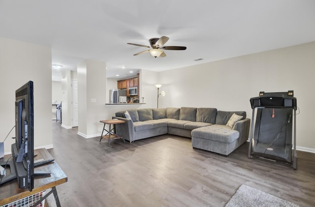 1005 Washitonia Way Unit B, Charleston, SC 29492 - living area with a ceiling fan, baseboards, and wood finished floors