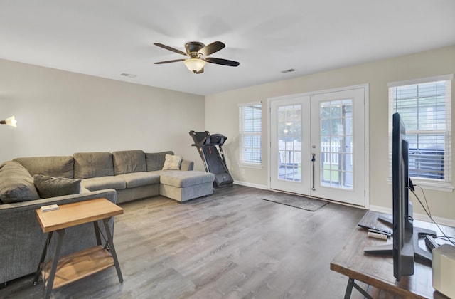 1005 Washitonia Way Unit B, Charleston, SC 29492 - living room with french doors, wood finished floors, ceiling fan, and baseboards
