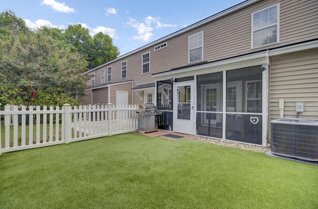 1005 Washitonia Way Unit B, Charleston, SC 29492 - rear view of house featuring central AC unit and a sunroom