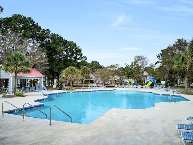 1005 Washitonia Way Unit B, Charleston, SC 29492 - community pool with a patio and view of wooded area