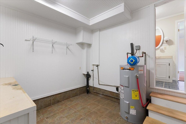 utility room featuring electric water heater