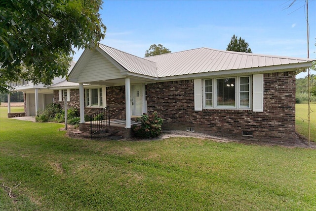 single story home featuring a front yard and a garage