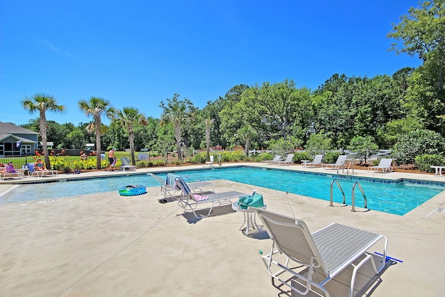 view of pool with a patio area