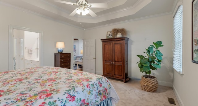 bedroom featuring visible vents, ornamental molding, baseboards, and light carpet
