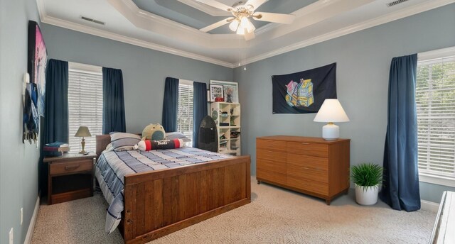 bedroom featuring visible vents, ornamental molding, and carpet