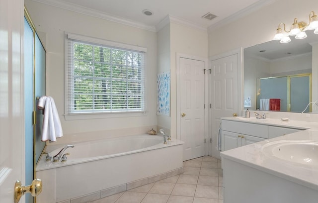 full bathroom featuring a bath, a sink, crown molding, double vanity, and tile patterned floors