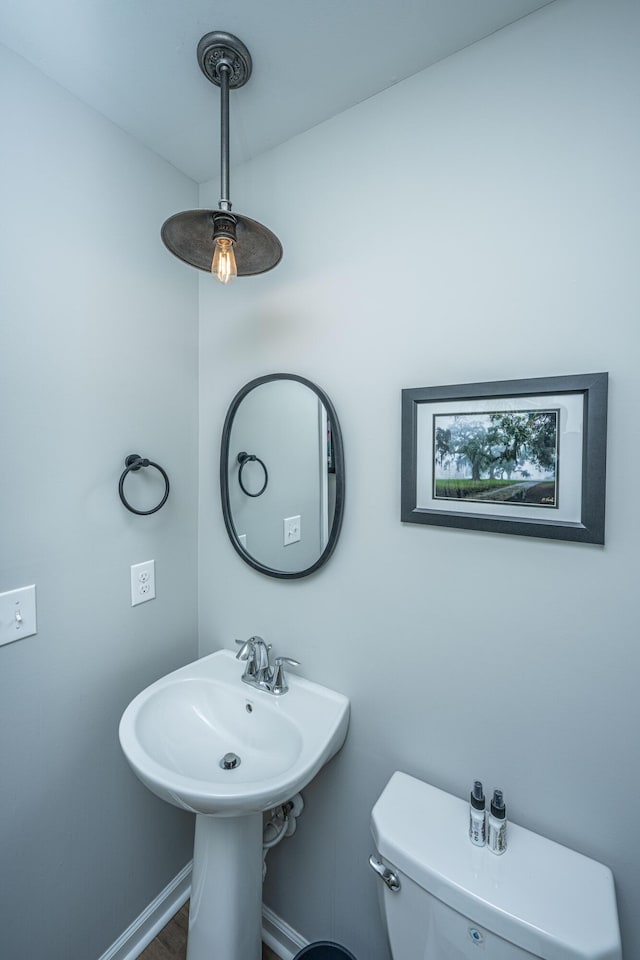 bathroom featuring toilet