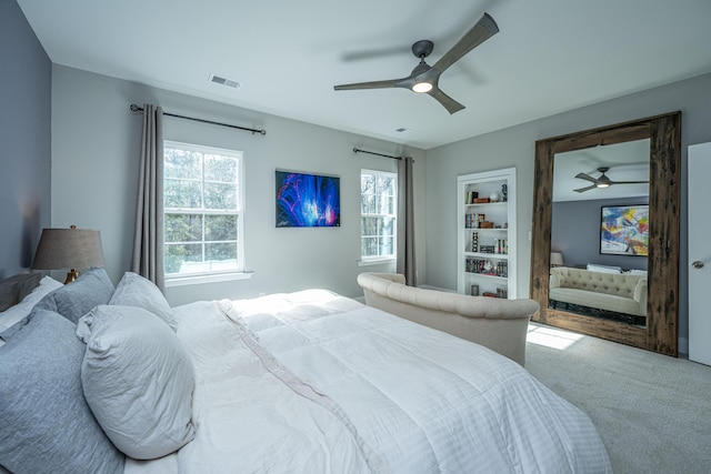 carpeted bedroom featuring ceiling fan