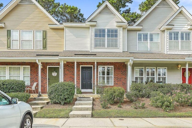 view of property with a porch